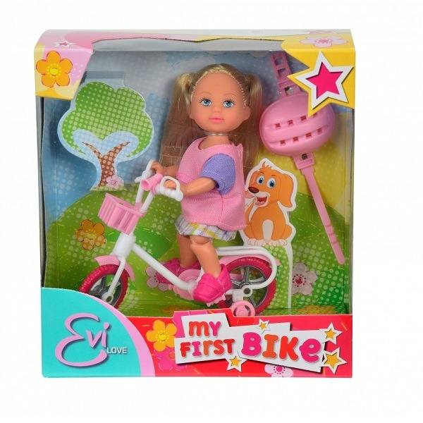 Évi baba kerékpárral rózsaszín pólóban - Evi Love